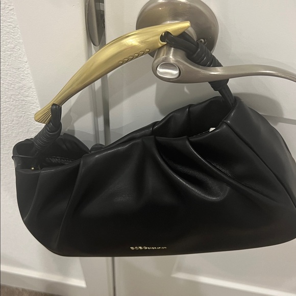 BCBGeneration Sleek Black and Gold Shoulder Bag - Picture 10 of 13